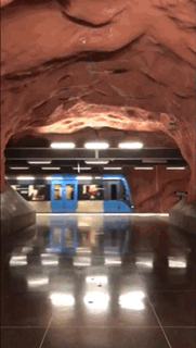 subway cave like station in Stockholm with colorful surface
